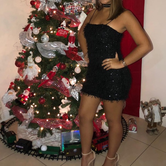 It’s a shinny dress. Only used for one night. - Picture 2 of 2